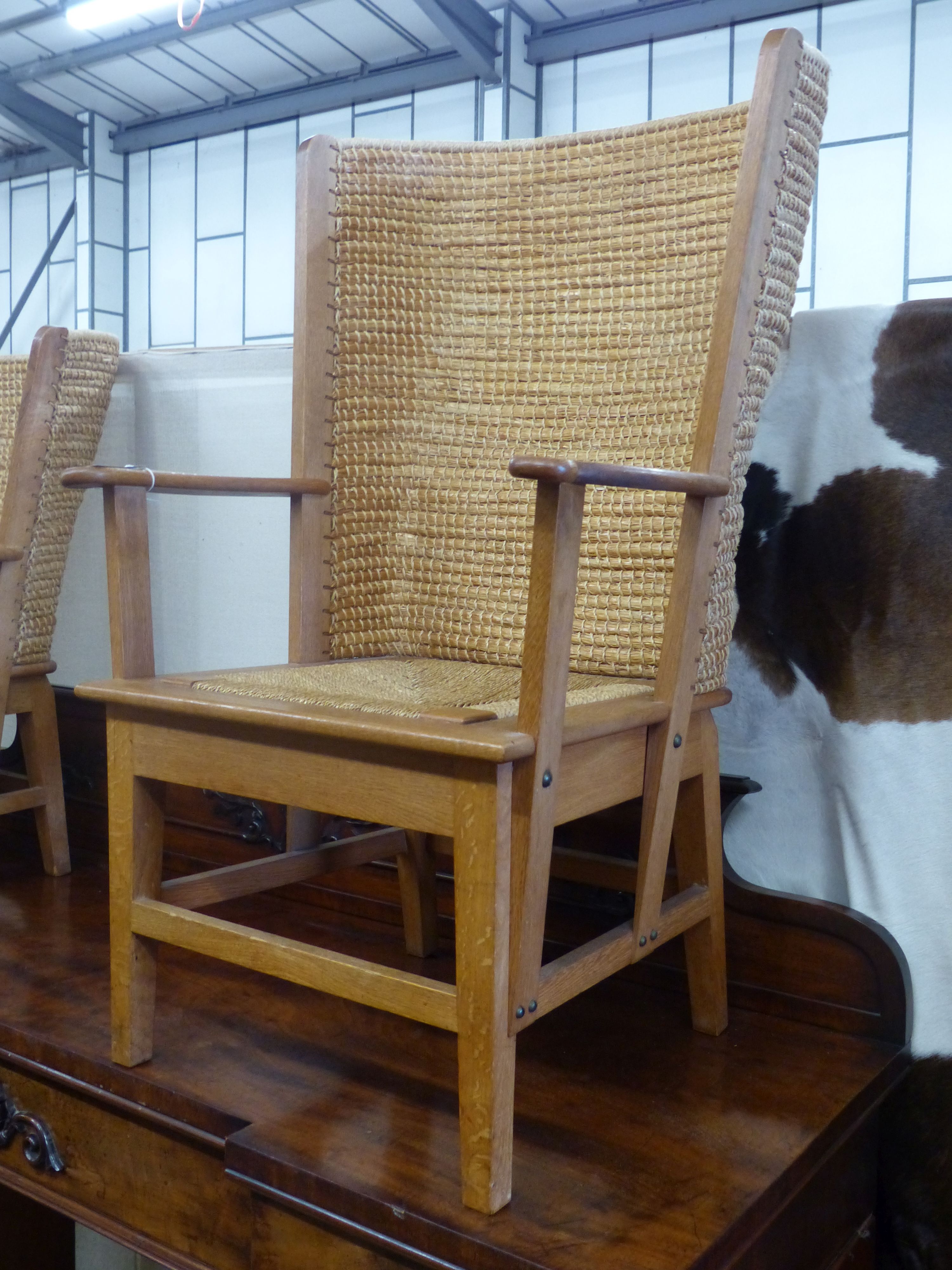 A 20th century light oak and skep work Orkney chair in traditional style, width 63cm, depth 60cm, height 106cm